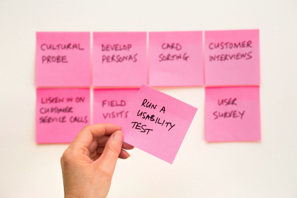 Post-it reminder to run a usability test as part of the UX design process