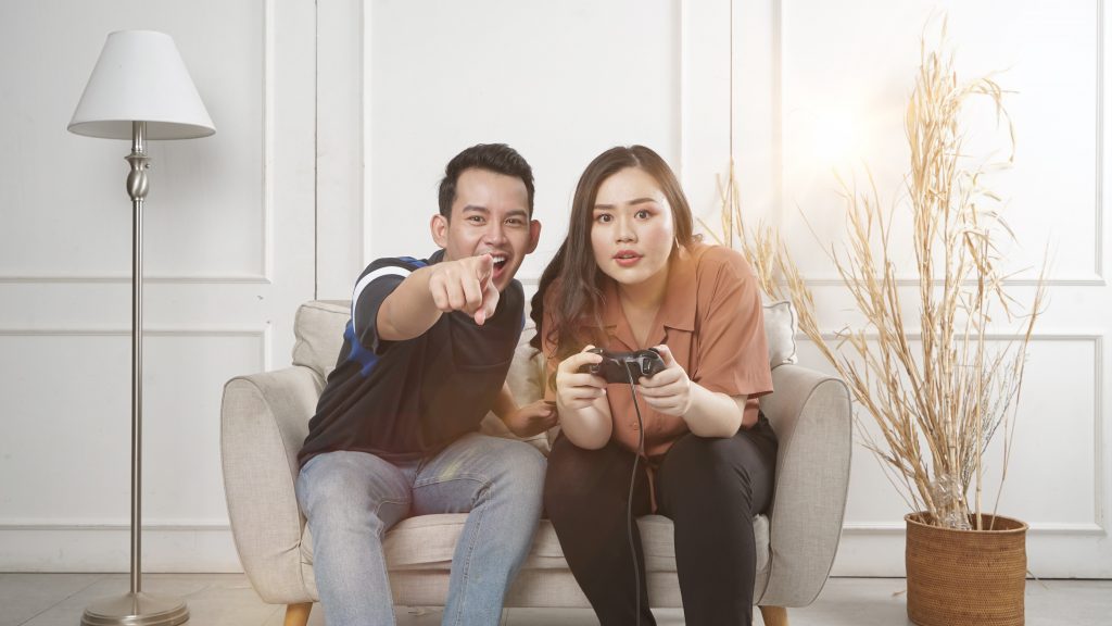 Image of a couple playing a video game